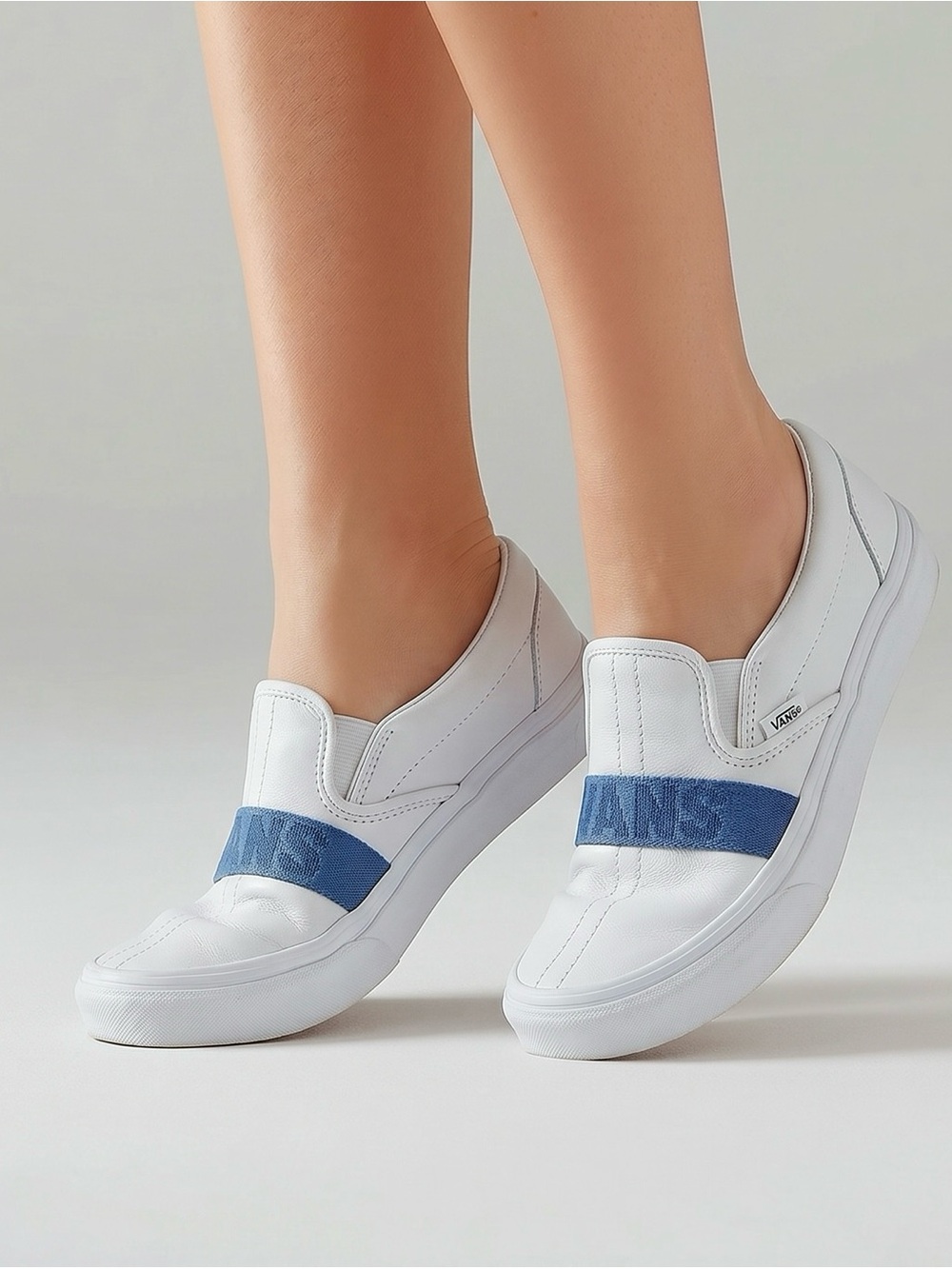 Vans White Slip-On Leather Sneakers with Blue Logo Band